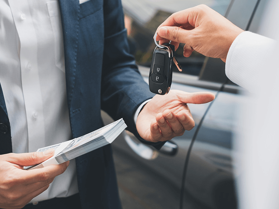 Man trading his car for cash