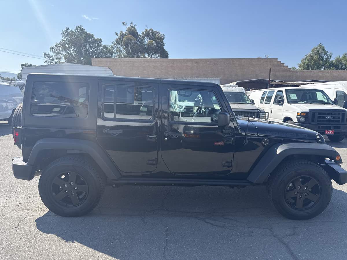 2016 Jeep Wrangler Unlimited Black Bear photo 6