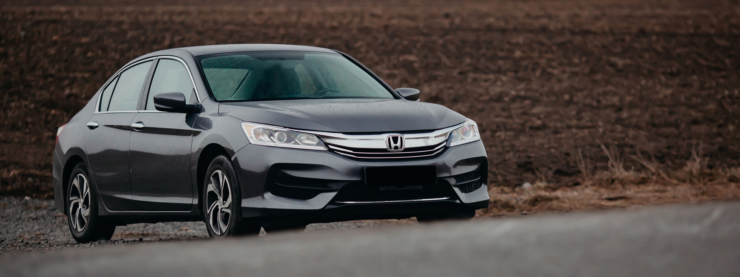 Gray Honda Accord on a highway