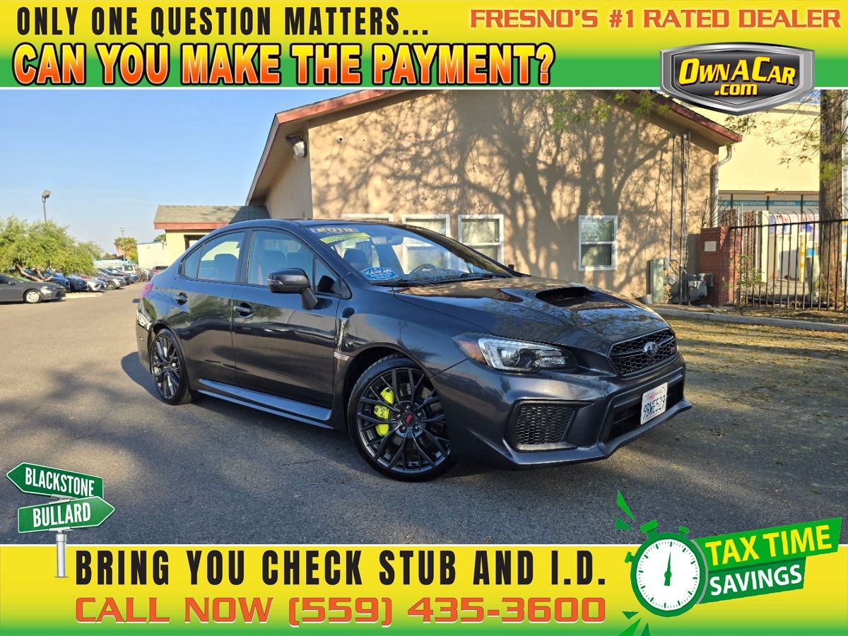 Subaru WRX STI Limited AWD with Low Profile Spoiler