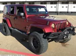 2012 Jeep Wrangler Unlimited Sahara photo 2