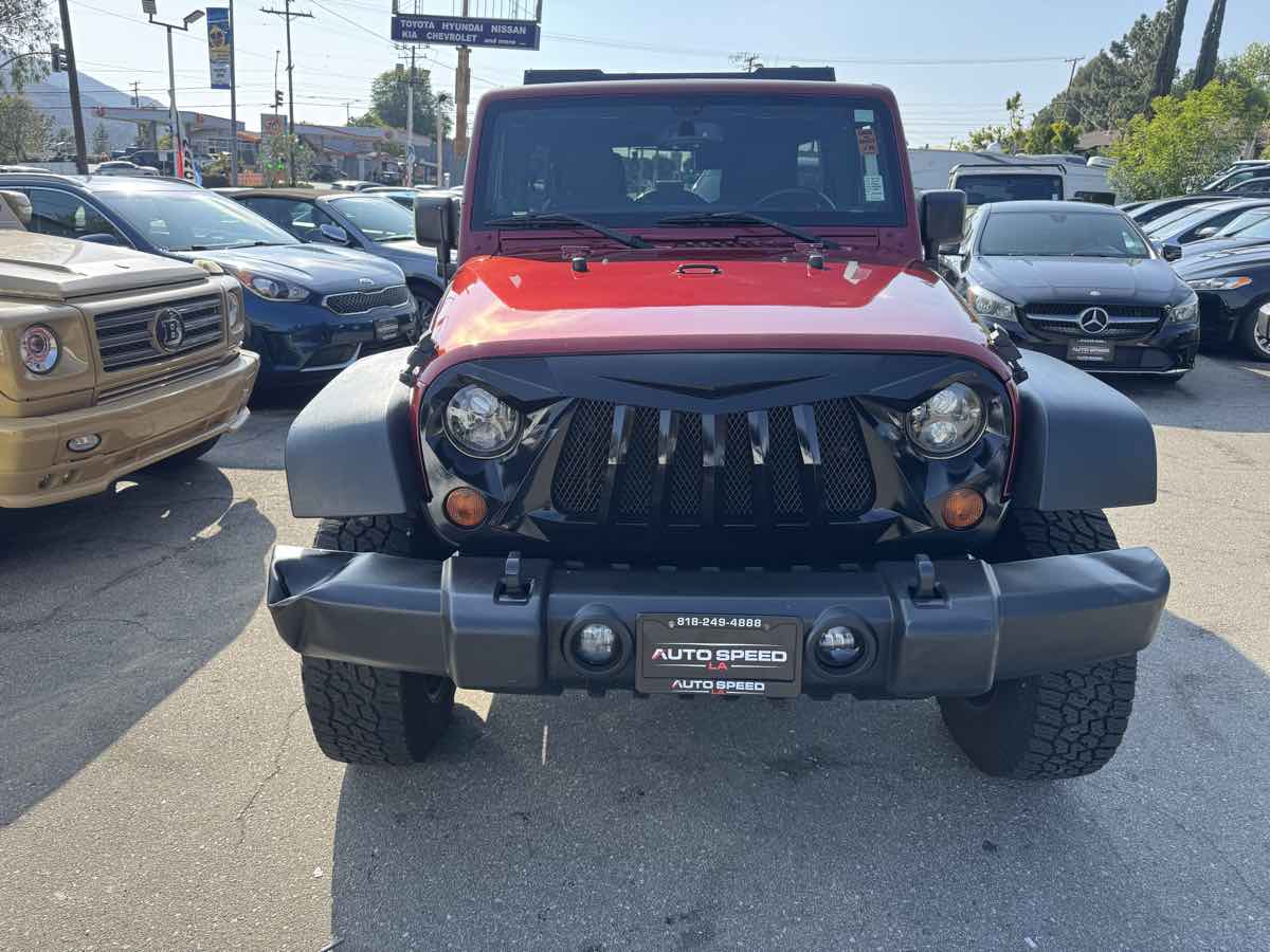 2013 Jeep Wrangler Unlimited Sport photo 2