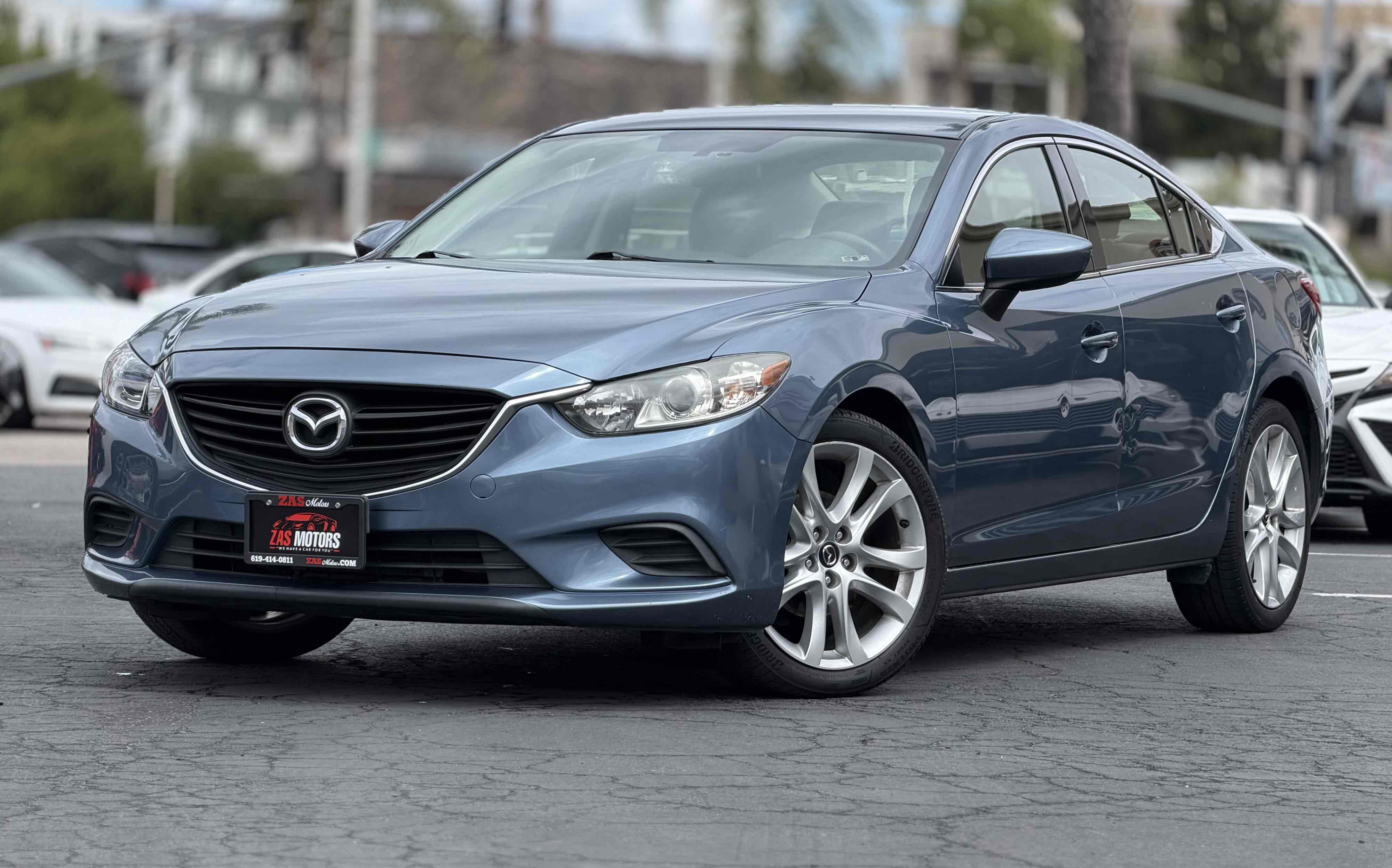 2014 Mazda EZ-6 i Touring Auto's photo
