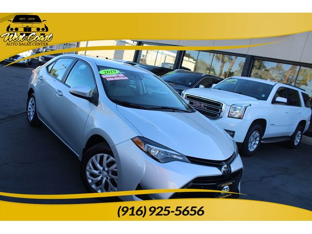 Classic Silver Metallic 2019 Toyota Corolla LE Sedan Front-Wheel Drive Automatic