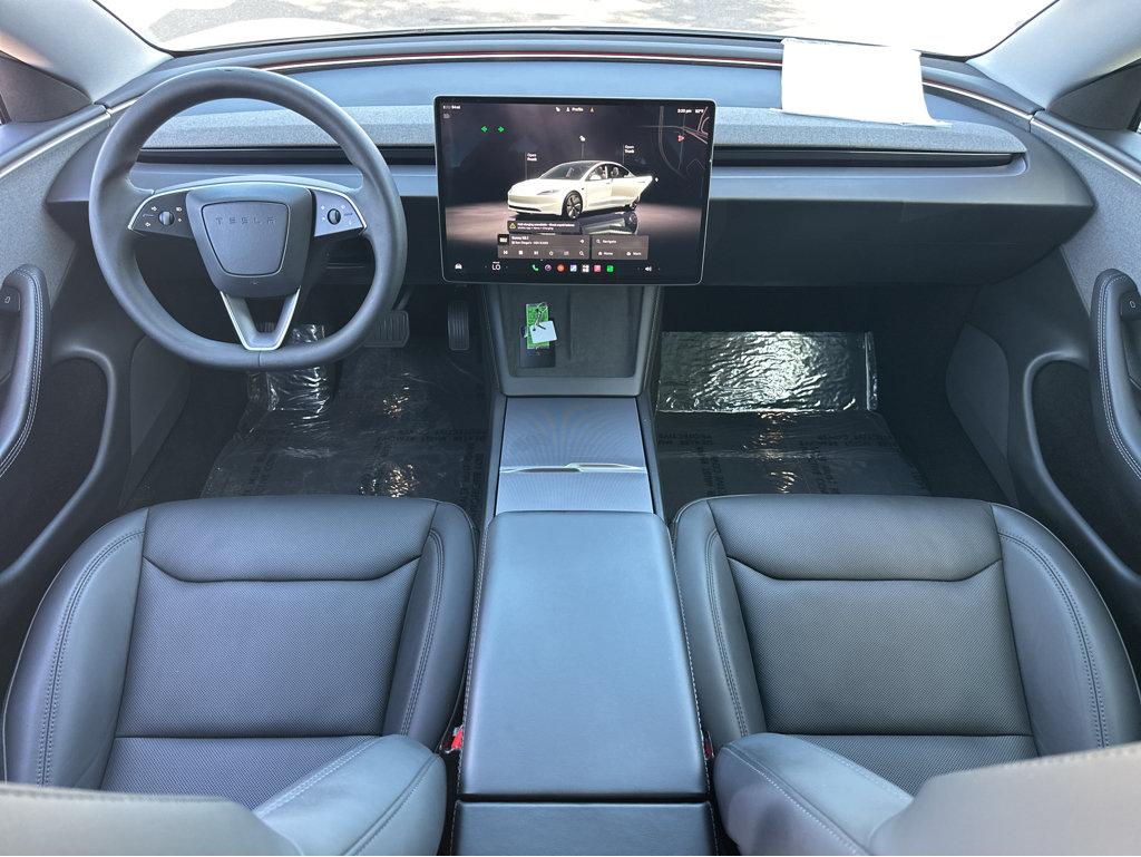 Tesla Model 3 photo 4