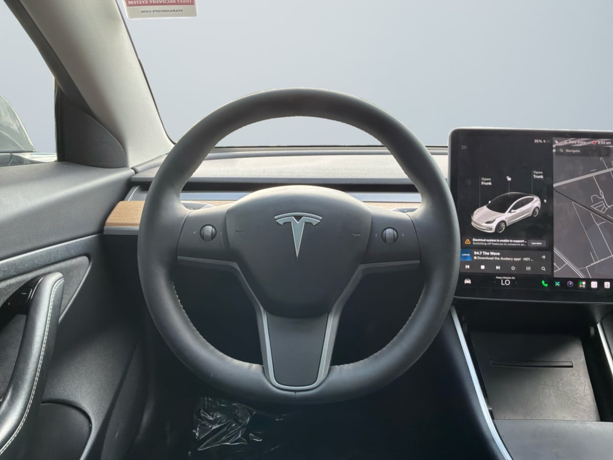 Tesla Model 3 photo 11