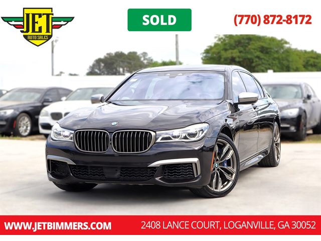 Red (Ruby Black Metallic) 2018 BMW 7 Series Sedan All-Wheel Drive Automatic