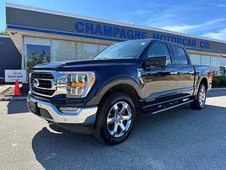 2021 Ford F-150 XLT 3.5L Power Boost Hybrid  MSRP of $63,910 new