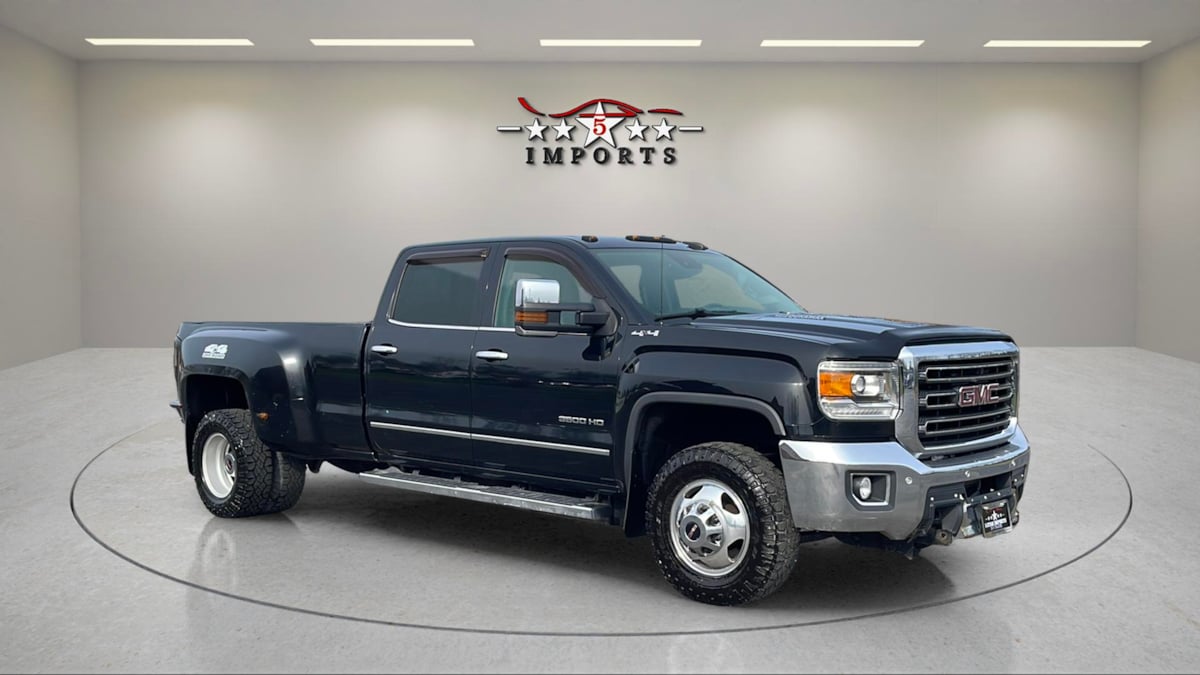 2015 GMC Sierra 4WD Crew Cab 6.5ft SLT SRW's photo
