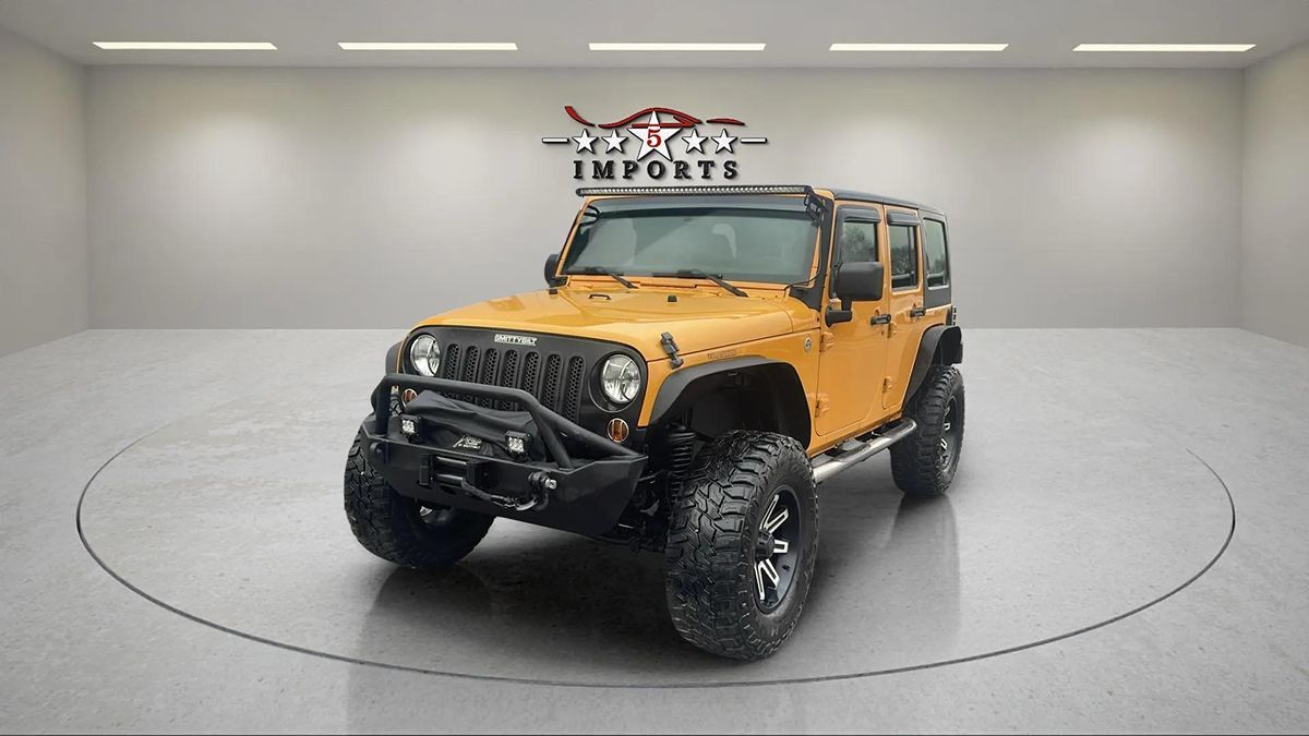 2012 Jeep Wrangler Unlimited Sport photo 2