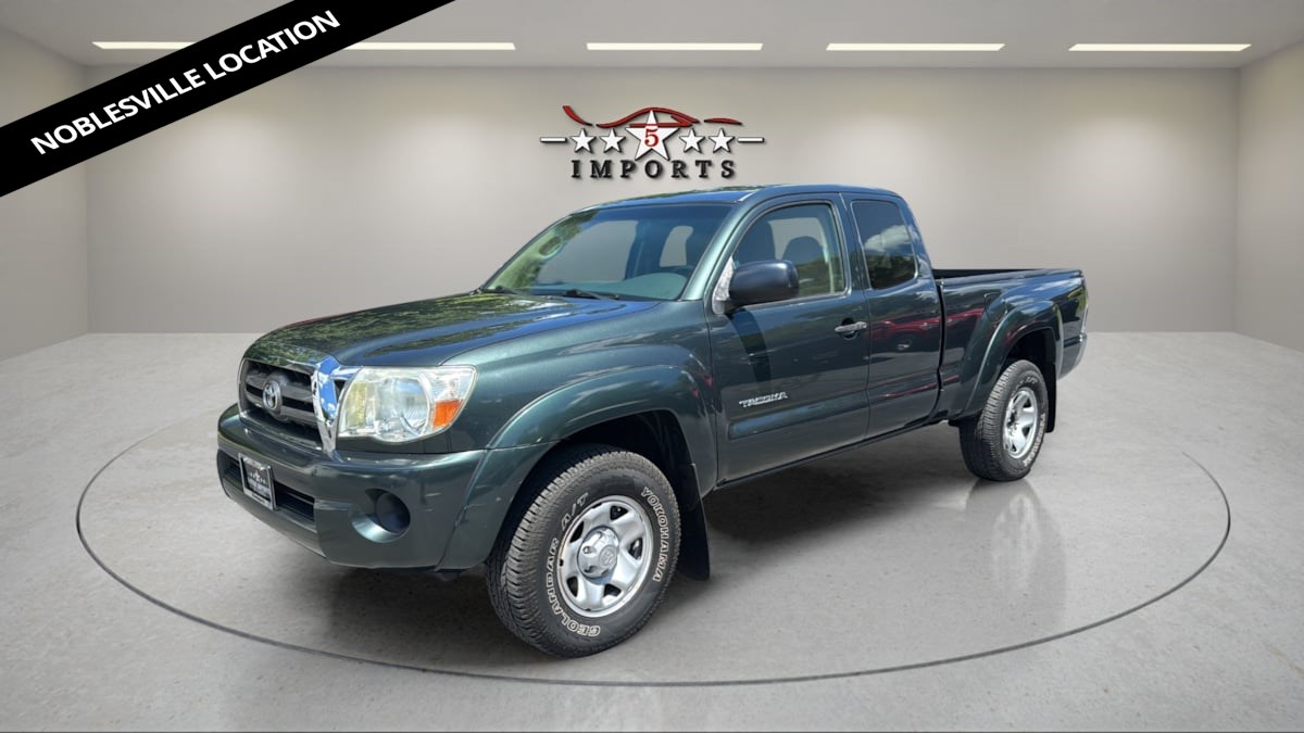 Green 2010 Toyota Tacoma Pickup Truck Four-Wheel Drive Manual