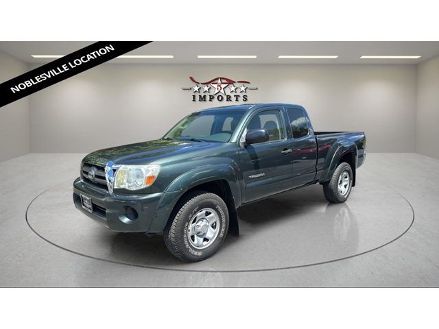 Green 2010 Toyota Tacoma Pickup Truck Four-Wheel Drive Manual