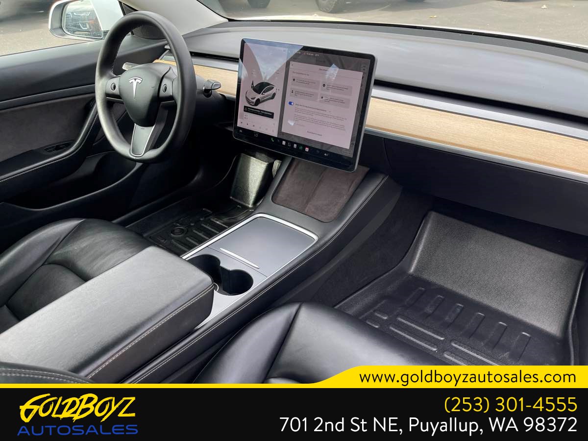 Tesla Model 3 photo 10