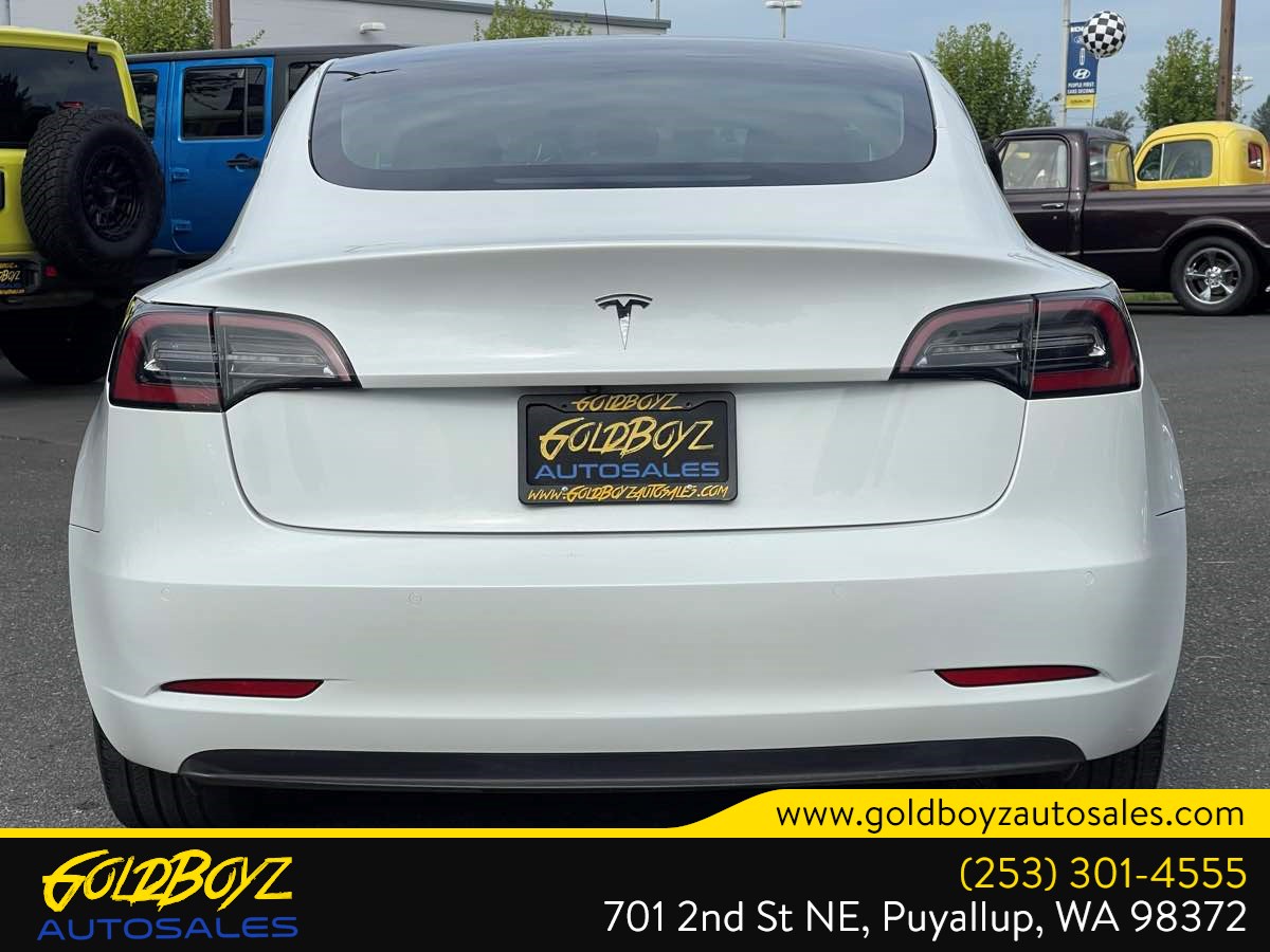 Tesla Model 3 photo 4