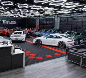 TopLine Auto Group showroom with luxury sports cars