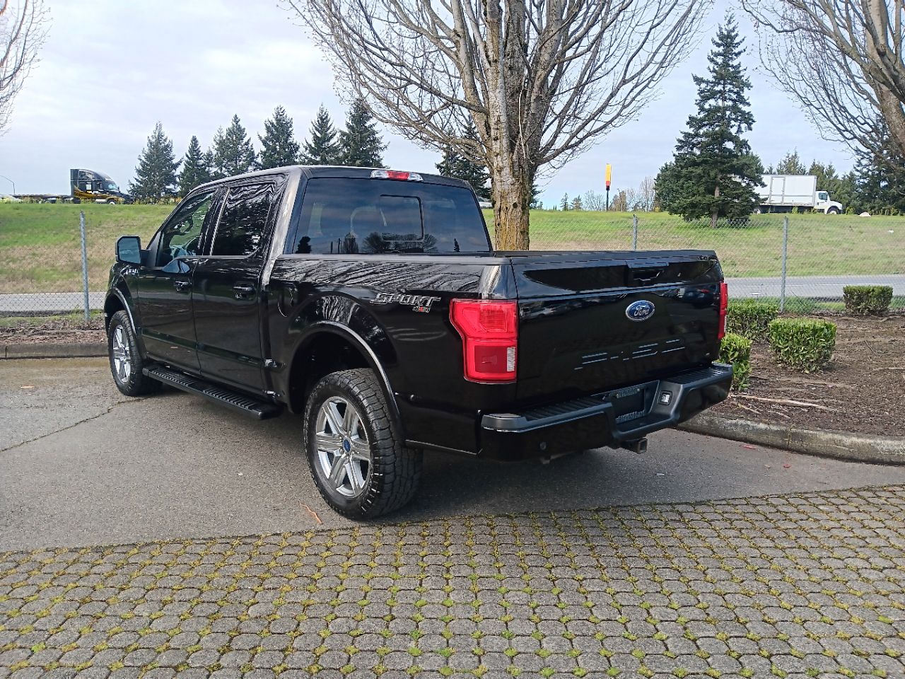 View vehicle photo 3