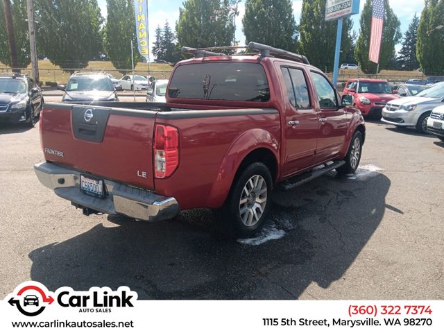 Red Brick 2010 Nissan Frontier Pickup Truck 4X2 Automatic