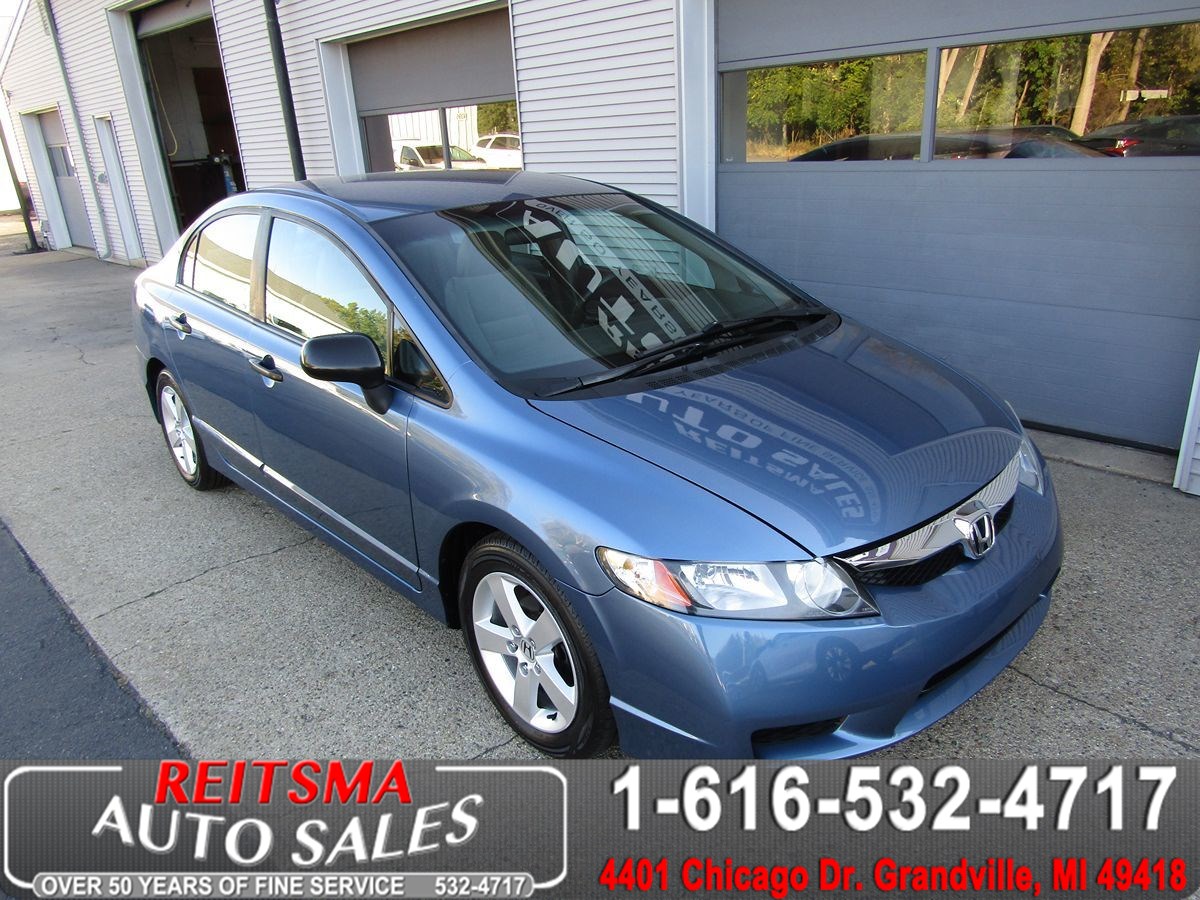 2011 Honda Civic Sdn DX-VP 1