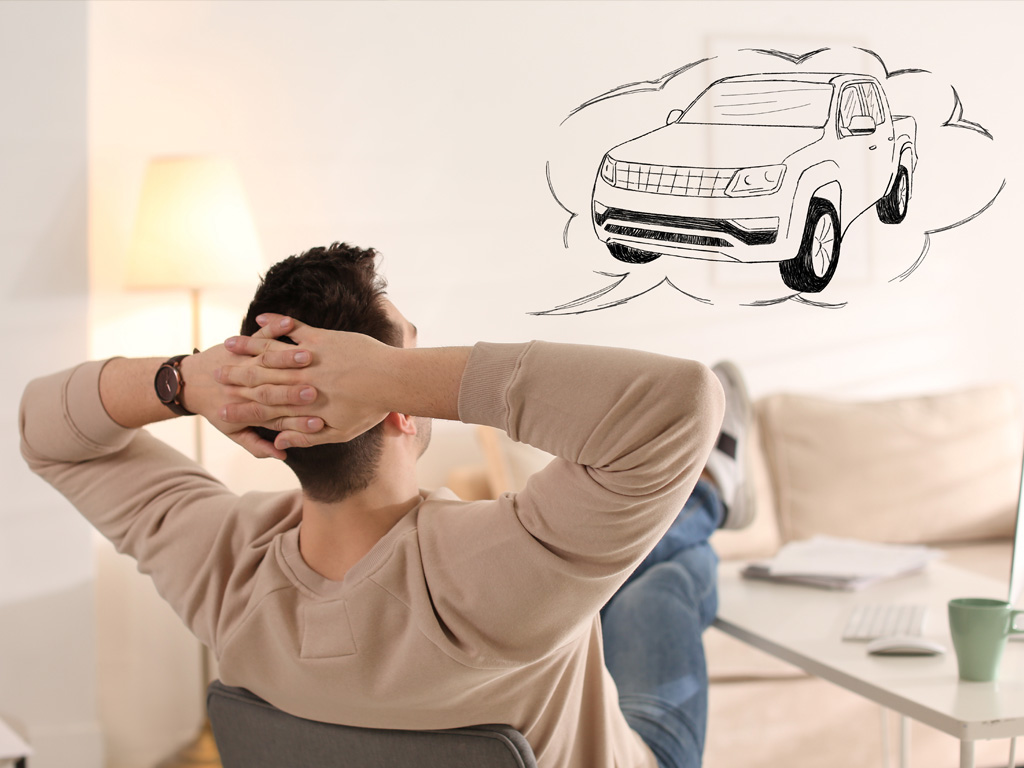 Person daydreaming about a new car.