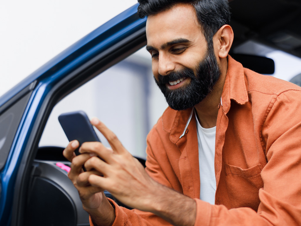 Person submitting an application conveniently on their cell phone.