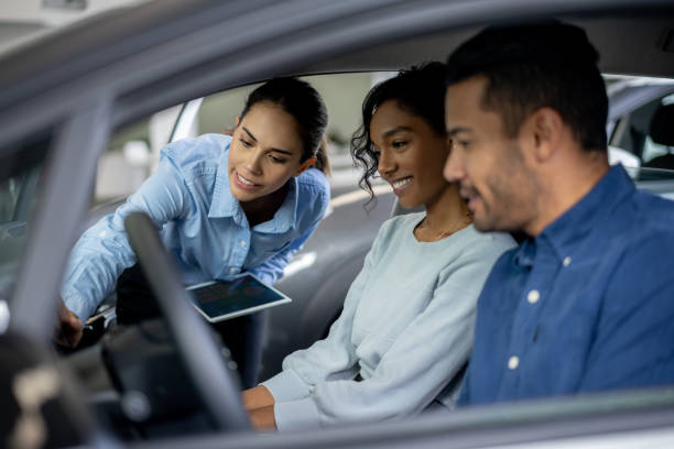 Employee and Customers at Dealership