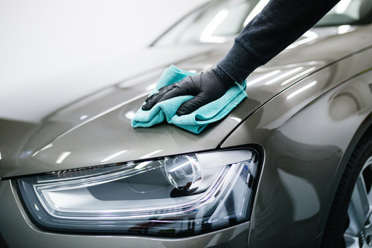 Drying the hood of your luxury car at Green Automotive