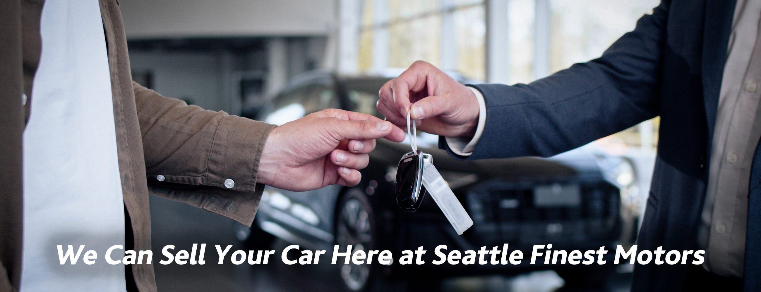 A satisfied seller consigning their car with Seattle Finest Motors.