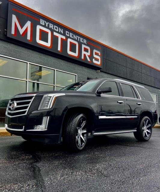 Black Cadillac escalade for sale at Byron Center Motors used car dealership in Byron Center MI 